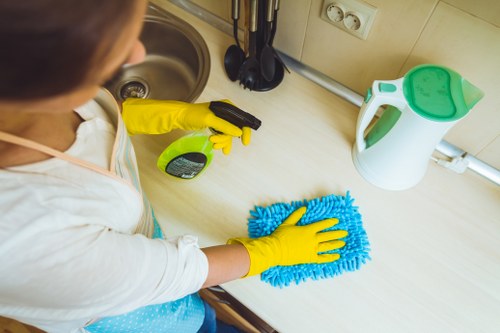Professional sofa cleaning equipment in use